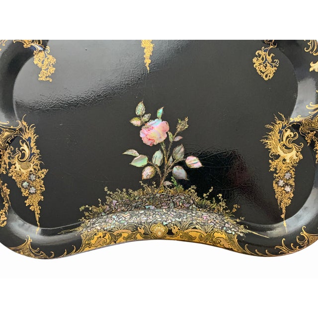 This beautiful 19th-century English papier-mâché parlor maid tray features raised edges, luminous crushed-shell mother-of-...