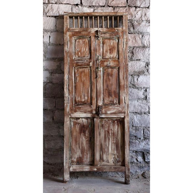 Bring timeless character and artisan craftsmanship to your space with this authentic antique carved teak wood door....