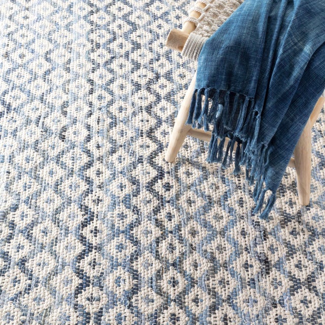Our design team revamped our bestselling cotton denim rag rug with a natural ivory overlay adding modern geometric...