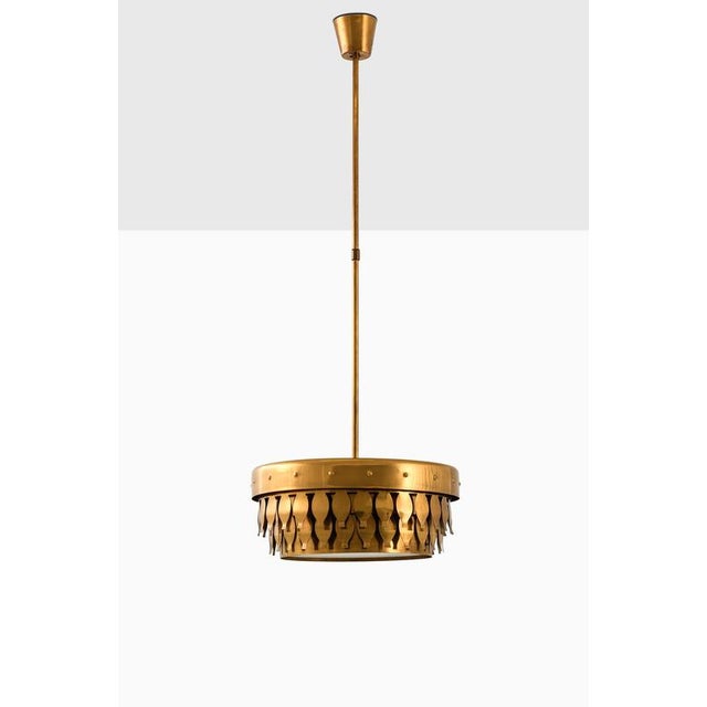 The rare ceiling lamp designed by Uno Dahlén and produced by Aneta in Sweden during the 1960s is a distinctive example of...