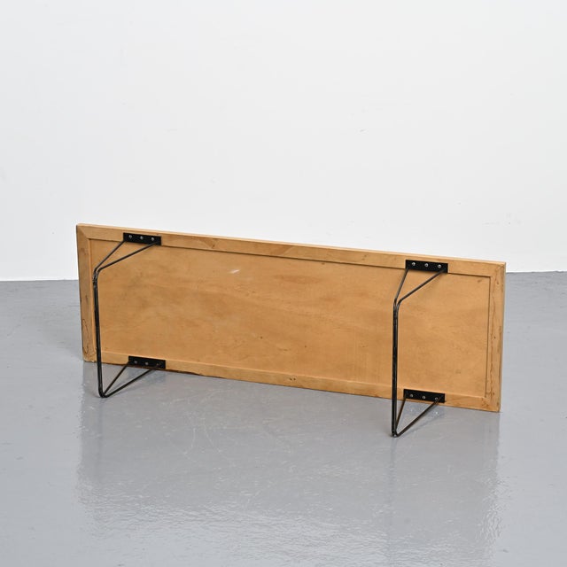 Coffee table model CM 191 designed by Pierre Paulin in the late 1950s, produced by Thonet. The rectangular top in...