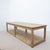 An imposing early 20th-century draper's table in raw oak, boasting beautiful proportions and a simple yet robust...