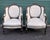 Lovely pair of vintage French Louis XVI bergere chairs upholstered in a beautiful white moonstone brocade. Tufted backs...