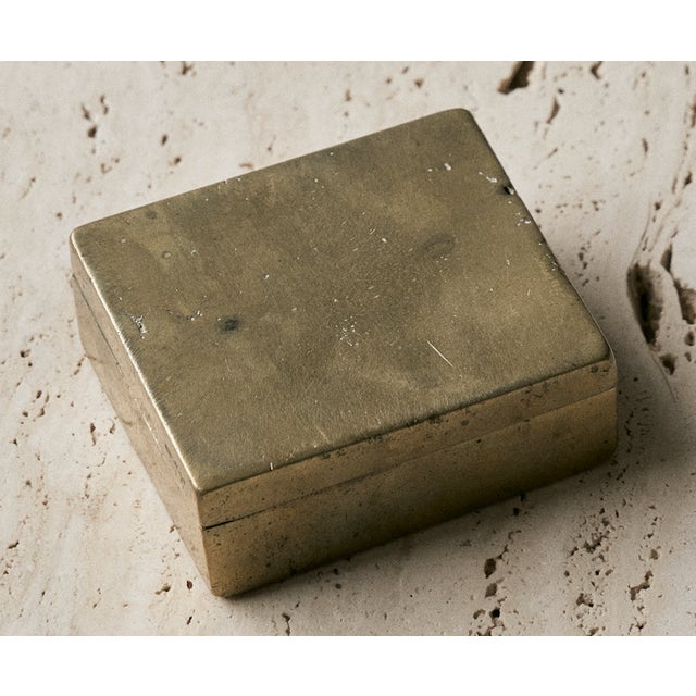 19th Century brass betel nut box. This tiny brass box is the perfect decorative accessory to add a pop to any table top it...