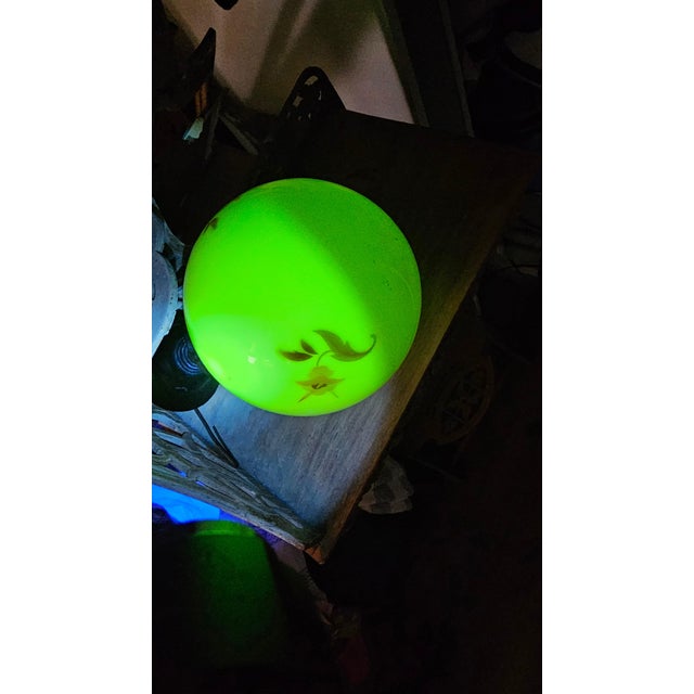 Art deco brass plafond celling lamp, 1920s, uranium glass shade, signed., dimensions: height 24 cm, diameter of the...