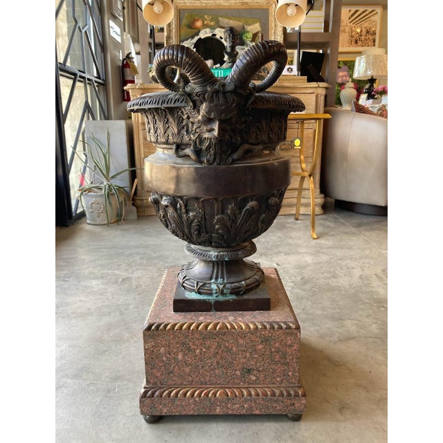 Elevate your space with this striking Late 19th neoclassical urn, crafted with timeless elegance and bold classical...
