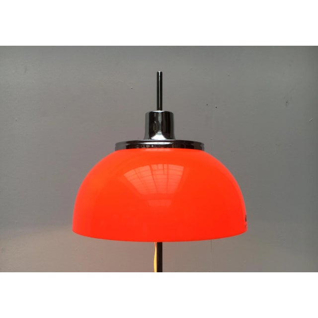 Faro table lamp by Guzzini. Here is an early version (Art. 2248) from the production period of 1970 - 1972. The lampshade...