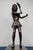 This exceptional mid-century modern solid cast brass female tennis player sculpture stands a commanding 14 inches tall and...