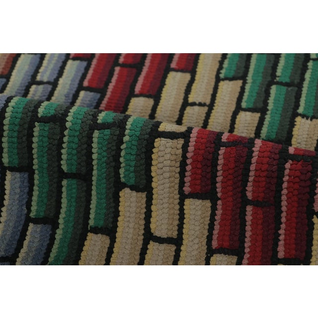 This antique gift-size 2x3 hooked rug, circa 1920–1929, features a striking geometric design composed of brick-like motifs...