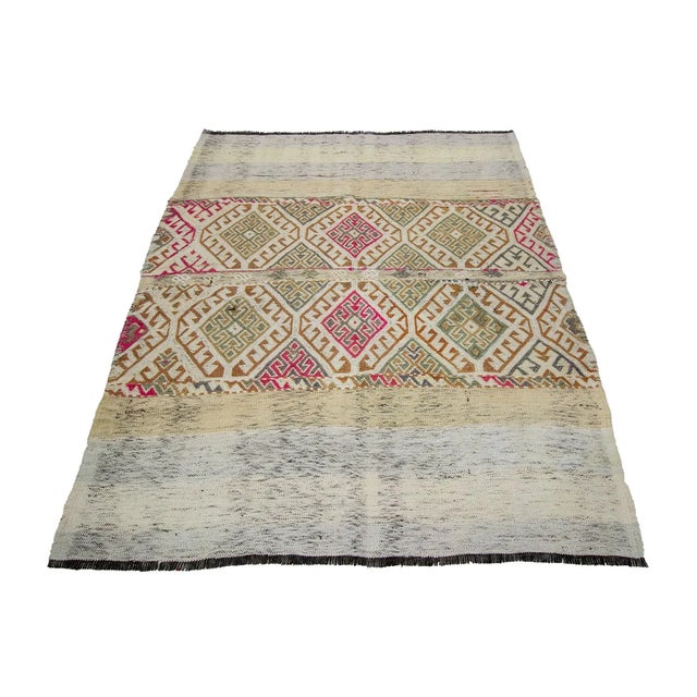 Decorative handwoven vintage kilim rug from Marash region of Turkey. Approximately 50-60 years old. In very good condition.