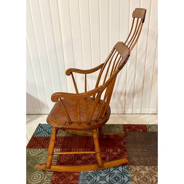 The Windsor “comb-back” chair became popular in the United States, during the Federal period (1780 through 1820)—they were...