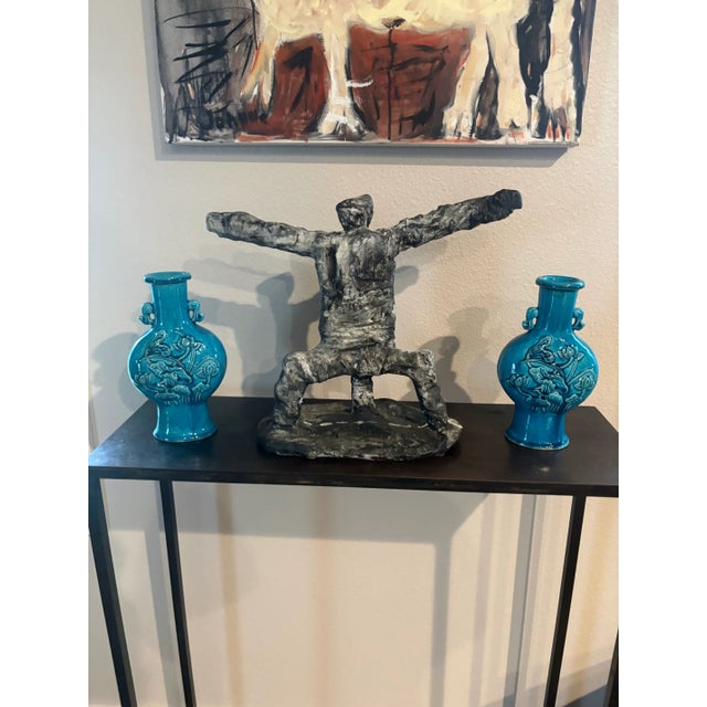 Elegant pair of vintage Chinese Turquoise Glazed Vases with a rich patina. Standing 8.75” high by 5” wide and 3" deep....