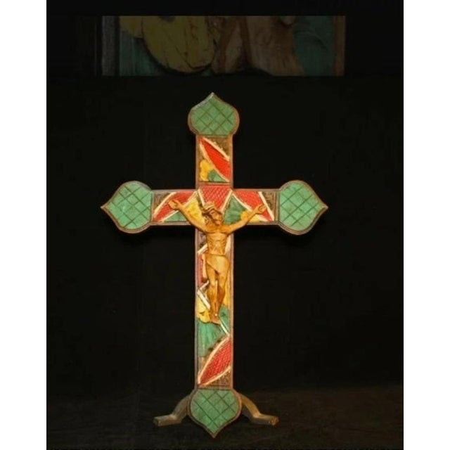 This is an example of ex-voto retablo devotional “gratitude” painting on a crucifix with an unpainted Jesus figure. The...