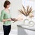 Elevate your home décor with this modern white ceramic vase, featuring a unique hollow center design and unglazed frosted...