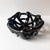 Stunning woven braided ceramic centerpiece bowl glazed in a chic glossy black. Great size for a coffee table or entryway....