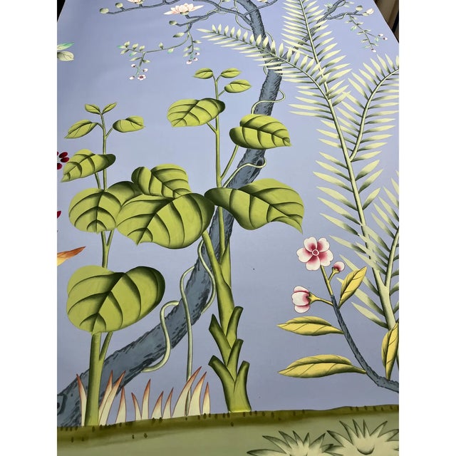 Hand-Painted Blue Botanical Garden Wallcovering Transform an interior with the quiet elegance of a hand-painted botanical...