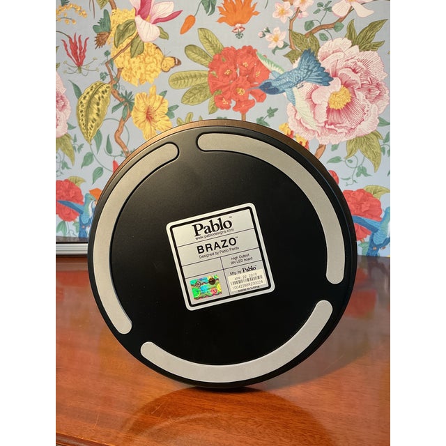 Sleek and modern set of six Pablo Brazo table lamps, celebrated for their minimalist design and highly adjustable LED arms...