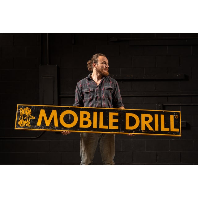 c. 1960s Mobile drill tin advertising sign for a drill rig manufacturer in Indianapolis. This piece has been mounted on...