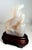 This agate is a truly lovely translucent to opaque. The horse is well-carved. The wood base is carved to fit. Country of...