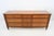 Elegant Kindel Grand Rapids nine-drawer dresser crafted in rich cherry, featuring refined neoclassical styling with fluted...