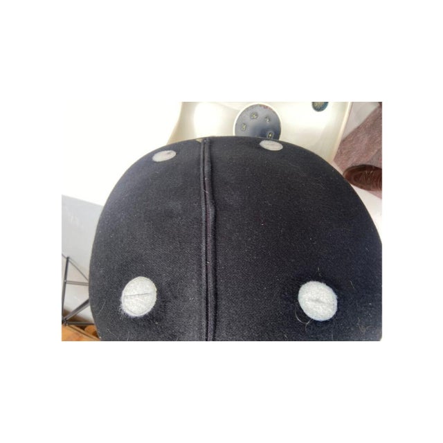 Four swivel “TULIP” chairs with white fiberglass shells on cast aluminum bases white lacquered. Seats with removable...