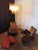 Fantastic chandelier with 36 transparent with an amber spot inside glasses, gold painted structure. The glasses are very...