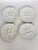 A beautiful set of four white glazed ceramic oyster plates, each featuring six oyster compartments and a central well for...