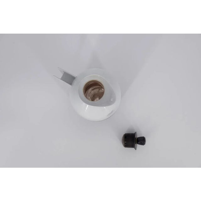 This thermal jug was designed by G. Rosendahl for the Swedish Falkenberg manufacture during the 1960s. Thermos flask made...