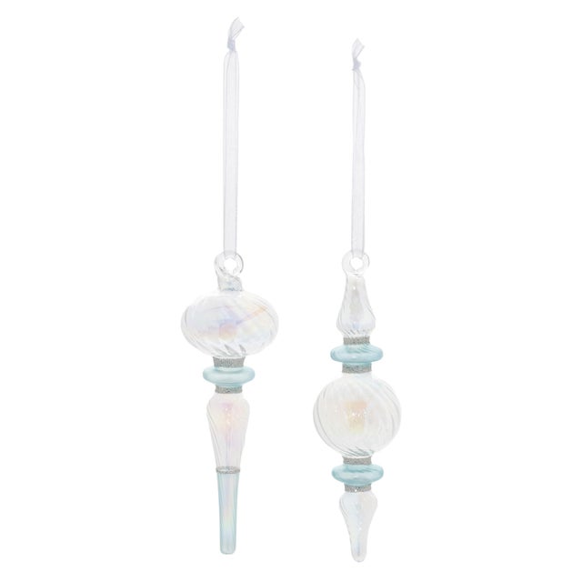 Enhance your holiday decorations with these exquisite Iridescent Finial Drop Ornaments. Featuring stunning wintry blue...