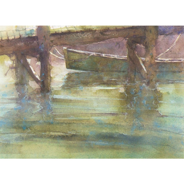 A watercolor painting of a boat by the American artist Bill Abell (1935-2026). This painting features a wooden boat tied...