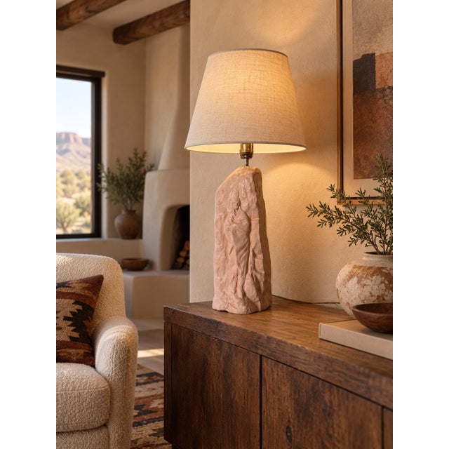 Unique 1980s vintage sculptural table lamp featuring a substantial ceramic body with a hand-modeled, rock-like form and a...