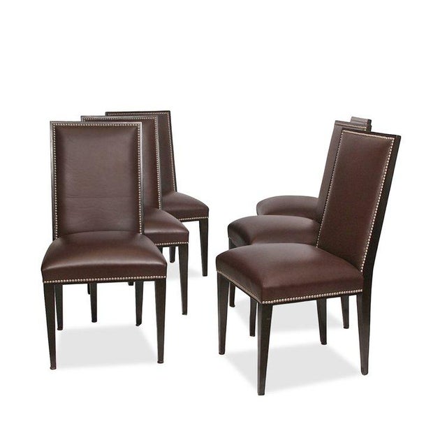 A sophisticated blend of elegance and craftsmanship, this set of six Henredon leather dining chairs showcases timeless...