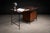 A sculptural Brazilian Modern table lamp by Dominici, Brazil, 1950s—executed in plated chrome and defined by its pure...