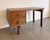 Beautifully refined and singular Oneida desk in Oiled Walnut from cult furniture designer Michael Robbins, finished with...