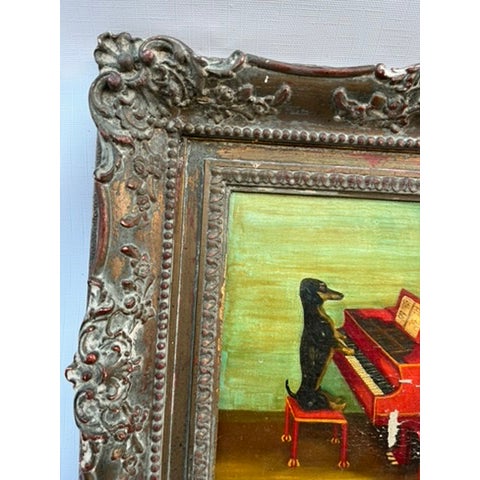 A single antique oil on canvas painting featuring a Dachshund dog seated on a red bench playing a red piano. Finished in...