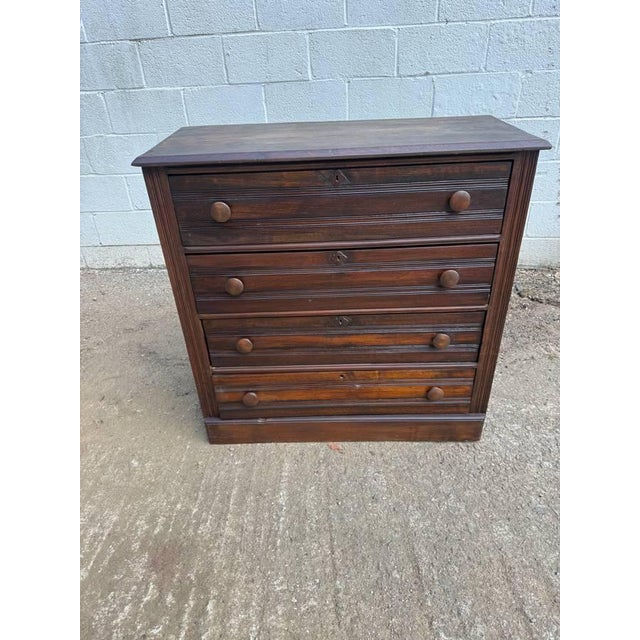 Antique Victorian Eastlake style Dresser or Chest With Three Drawers. It features large dovetailed drawers, round wooden...