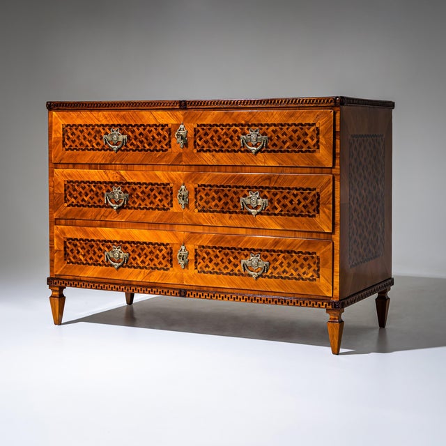 Louis XVI chest of drawers with three drawers and large finely cast bronze mounts. Raised on tapered square legs, the...