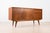 Introducing the sideboard designed by Sven Andersen – an exquisite masterpiece that seamlessly blends the timeless...