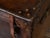 An English Victorian period leather hide hat case from the late 19th century, with G.C monogram, lined in red with...