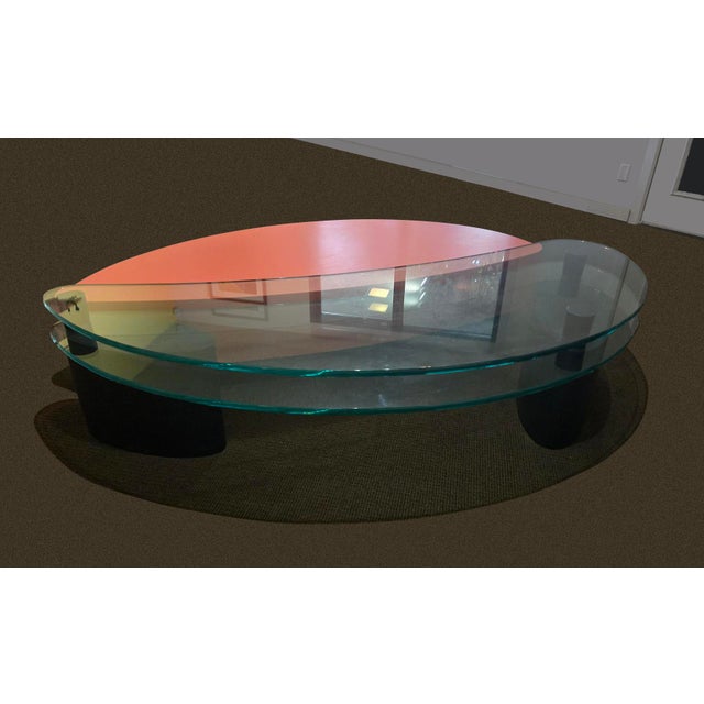 These curvy coffee tables have utterly free-form contemporary shapes and are strikingly seductive acting as foils for a...