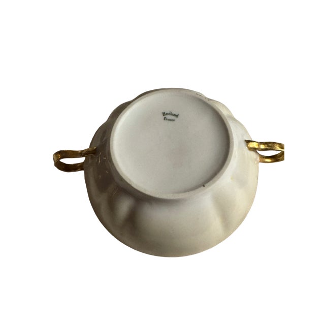Antique Haviland Limoge Cream Soup bowl with handles. Set of 2.Gold band at rim and on handles with a yellow rose border....