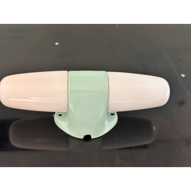 Light Blue Ceramic Model 6068 Sconce by Wilhelm Wagenfeld for Lindner, 1958, in Very Good conditions. Designed 1950 to...