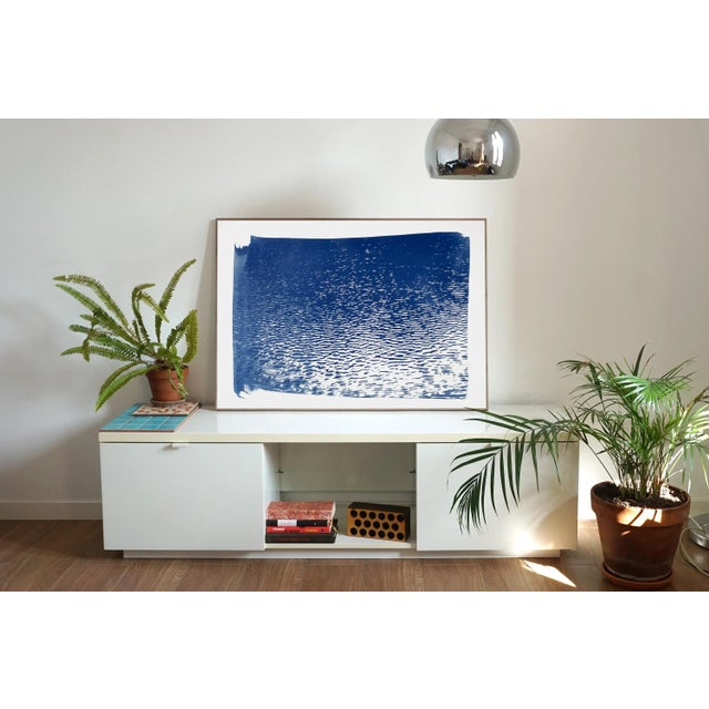 WHAT YOU'LL GET This is an exclusive and handprinted limited edition of a cyanotype print. "Lake Tahoe Panorama" shows a...