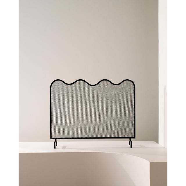 Featuring a single undulating line akin to the surface of water, the Wave Fire Screen instils deep sophistication into any...