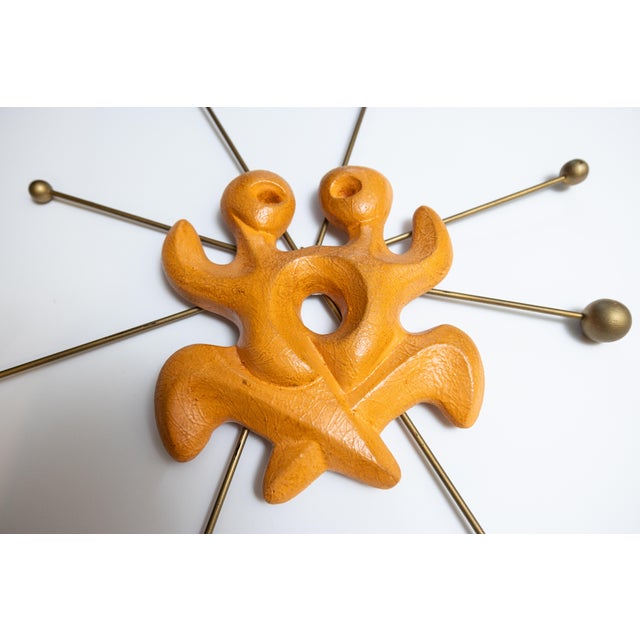 Original 1950s wall sculpture by American artist Frederic Weinberg. This rare "Gemini" double-figure model captures the...