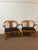 Opulent pair of large Chinese ming style horseshoe club chairs originally designed by James Mont. These chairs epitomize...