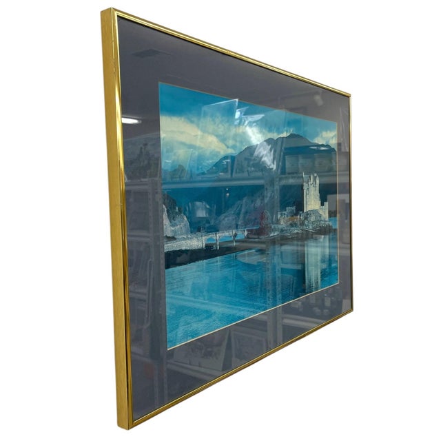 This listing features a vintage framed landscape photograph depicting a Castle. The image captures the stone castle set...