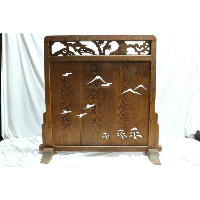 I love the delicate hand carving of this piece. This is a late 19th, early 20th century Chinese divider screen with hand...