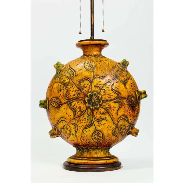 Single Unusual Ceramic and Wood Lamp with floral motif.