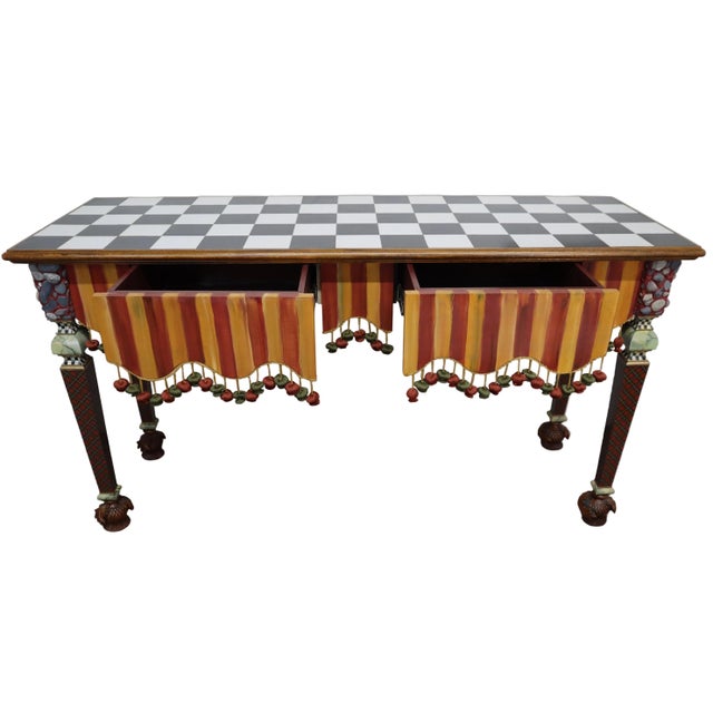 Add character to your space with this quirky and colorful MacKenzie-Childs accent table featuring two spacious drawers and...